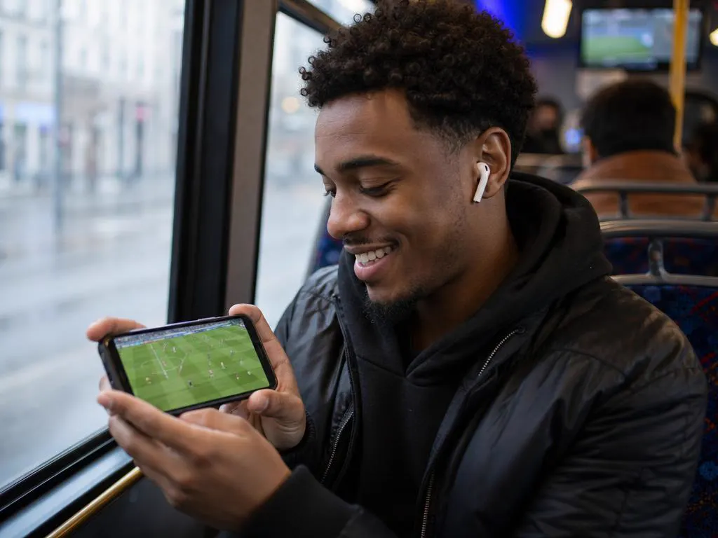 Commuter watching live sports in the IPTV Smarters Pro Android app on a phone
